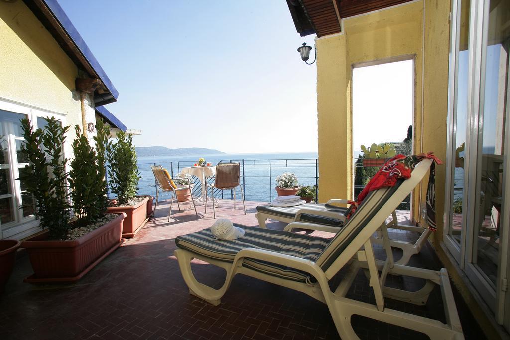 Villa Residence La Limonaia Гарняно Стая снимка